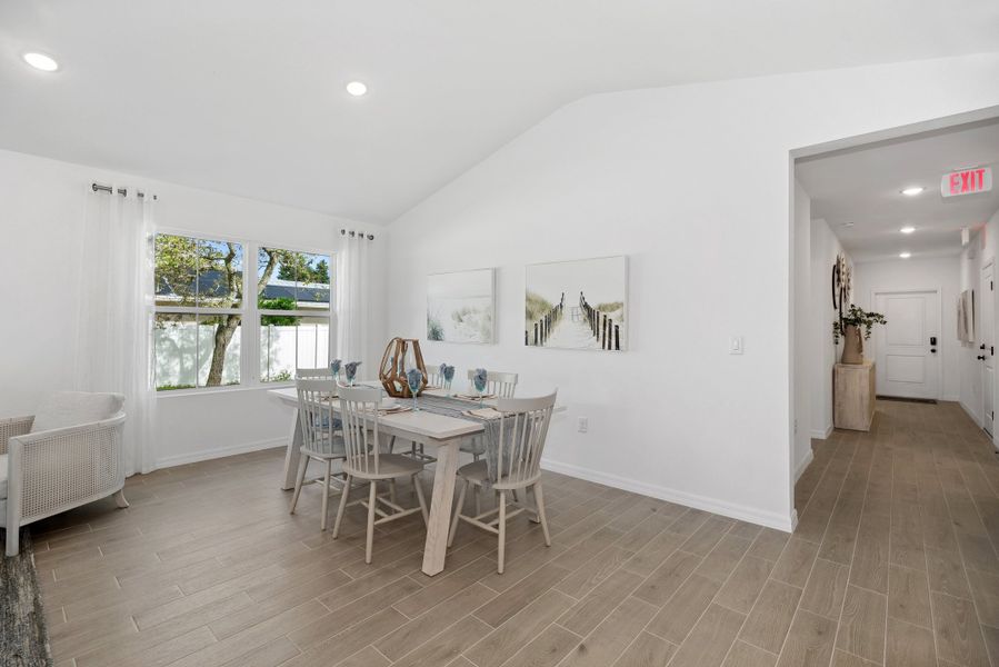 Dining area with vaulted ceiling