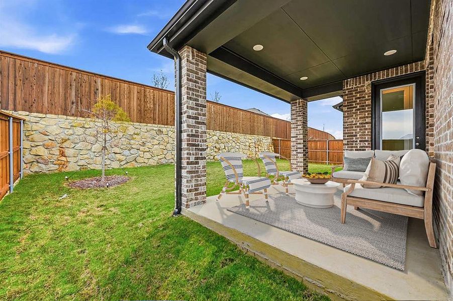 Exterior details and patio area of a home in Gateway Village - The Reserve, Denison (Image 3). Exterior details and patio area of a home in Gateway Village - The Reserve, Denison (Image 3).