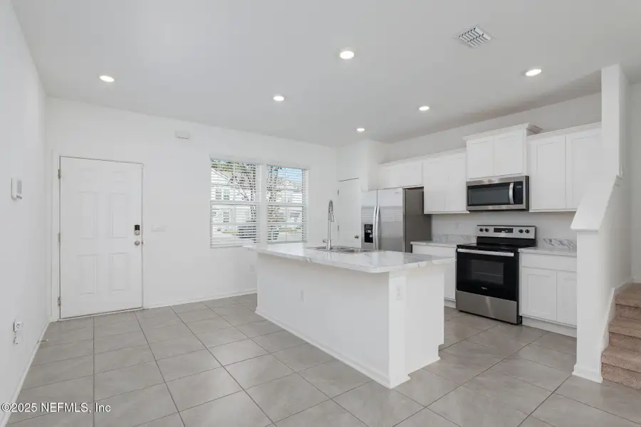 Furnished interior view inside a new home in Equinox East, Jacksonville (Image 4).