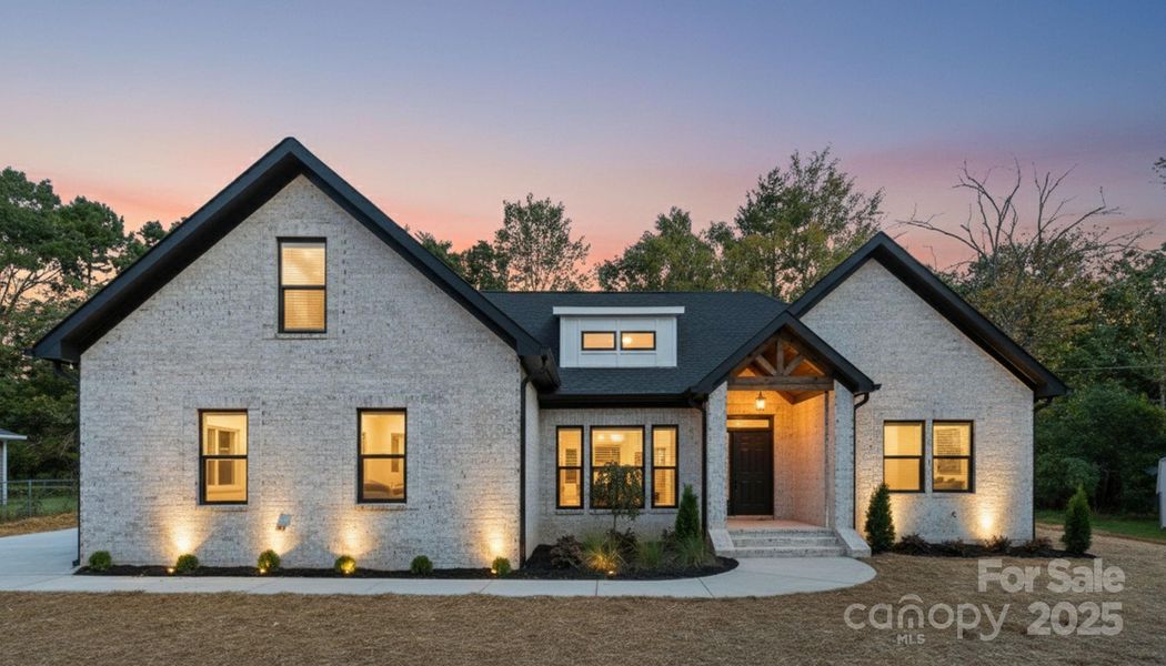 Front exterior of a new home in , Indian Trail, NC, highlighting curb appeal (Image 26). Front exterior of a new home in , Indian Trail, NC, highlighting curb appeal (Image 26).