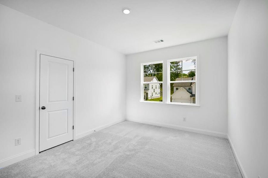 Spacious, unfurnished interior of a new home in Stratford Hills, Ball Ground (Image 13).