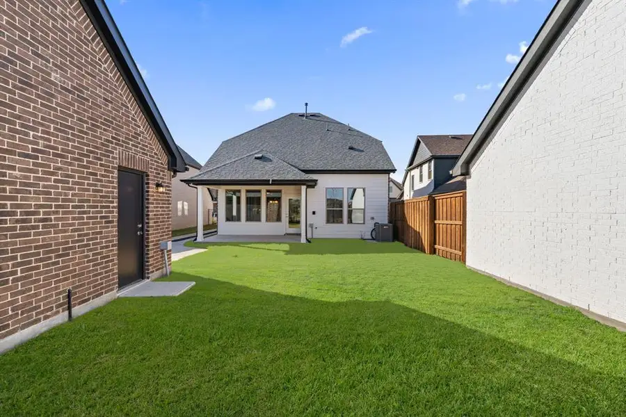 Lots of space to host great family bbq's in this large, private back yard!