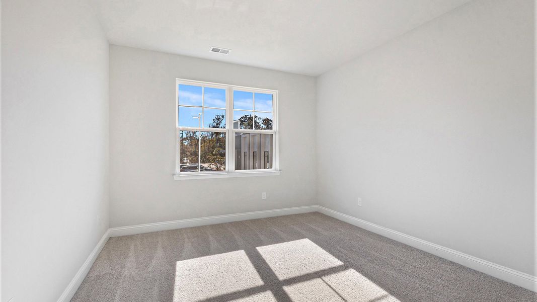 Spacious, unfurnished interior of a new home in Belle Park, North Myrtle Beach (Image 17).