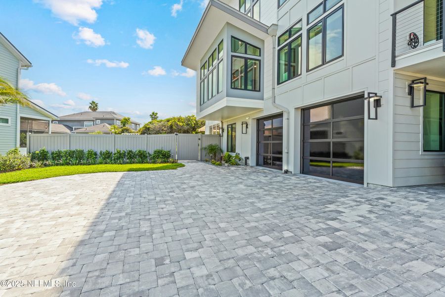Front exterior of a new home in , Ponte Vedra Beach, FL, highlighting curb appeal (Image 27).