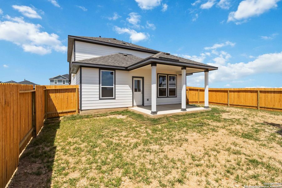 Front exterior of a new home in Hickory Ridge, Elmendorf, TX, highlighting curb appeal (Image 1).