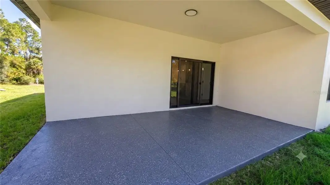 Exterior details and patio area of a home in , North Port (Image 17).