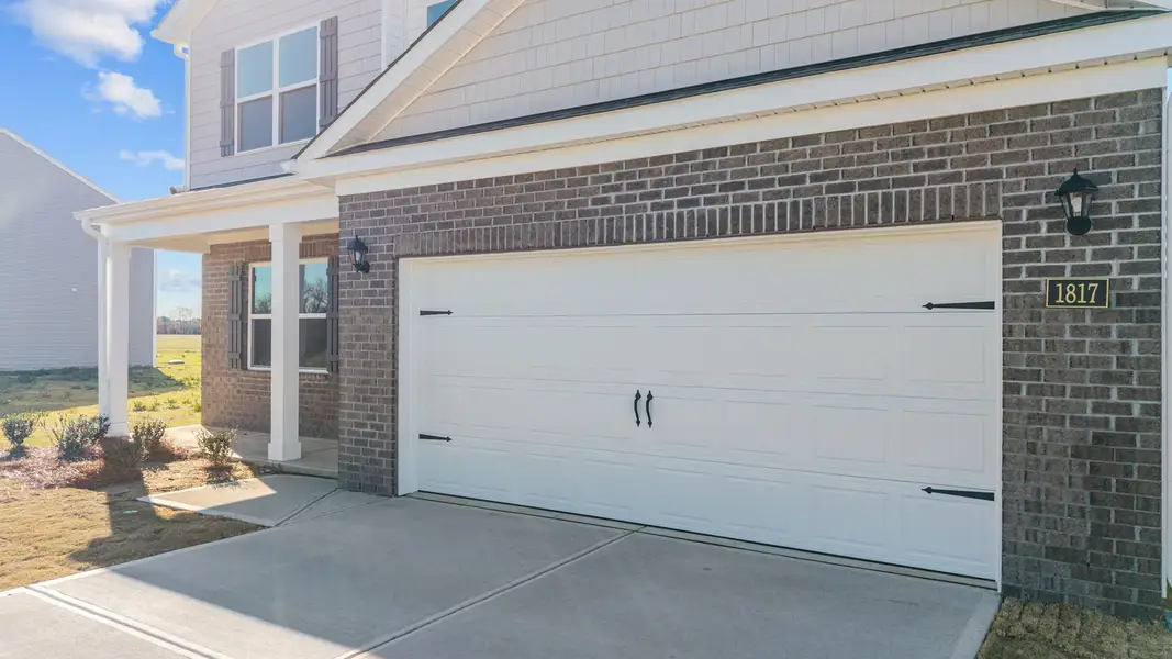 Exterior details and patio area of a home in Beaver Dam Crossing, Bailey (Image 4). Exterior details and patio area of a home in Beaver Dam Crossing, Bailey (Image 4).