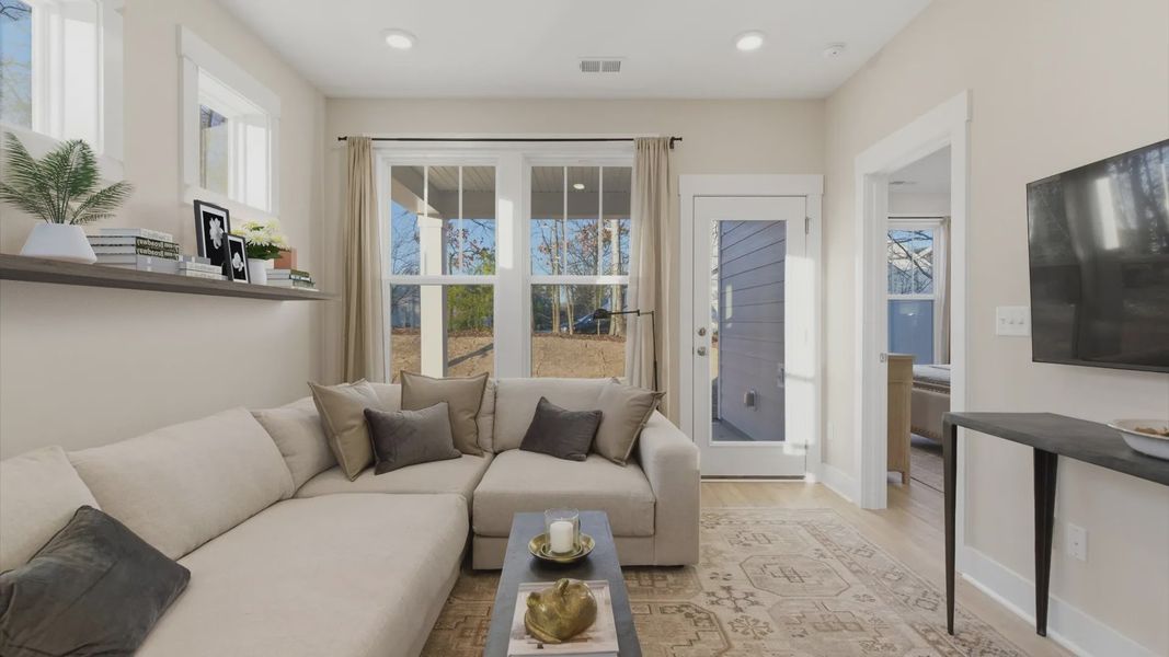 First-class family room of the Lawson Design offering comfort and style with an elegant balance of space and detail in SC