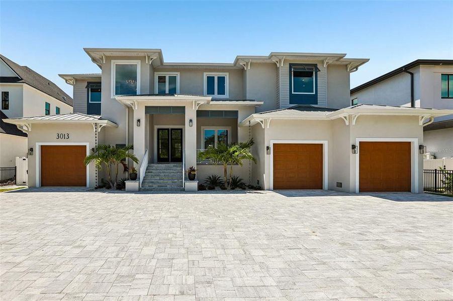Front exterior of a new home in , Tampa, FL, highlighting curb appeal (Image 26).