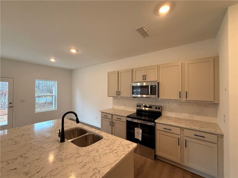 Furnished interior view inside a new home in Leydenview, Mableton (Image 35).