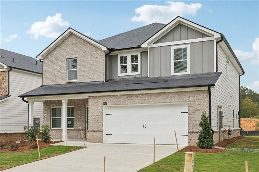 Front exterior of a new home in Westmont Preserve, Powder Springs, GA, highlighting curb appeal (Image 2).