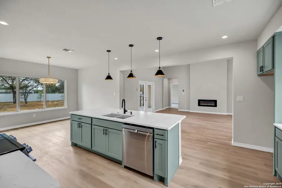 Furnished interior view inside a new home in , Elmendorf (Image 8).