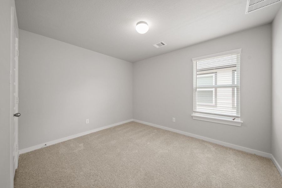 Spacious, unfurnished interior of a new home in Morton Creek Ranch, Katy (Image 23).