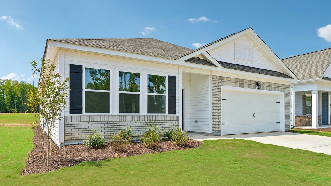 Representative exterior photo of a completed home built from the Aberdeen by D.R. Horton in The Villas at Laurel Oaks, Sanford, NC (Image 2). Representative exterior photo of a completed home built from the Aberdeen by D.R. Horton in The Villas at Laurel Oaks, Sanford, NC (Image 2).
