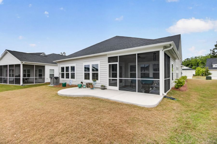 Exterior details and patio area of a home in Horizons at Summers Corner | 55+, Summerville (Image 3).