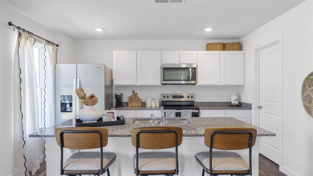 Furnished interior view inside a new home in Crescent Ridge, Niota (Image 9).