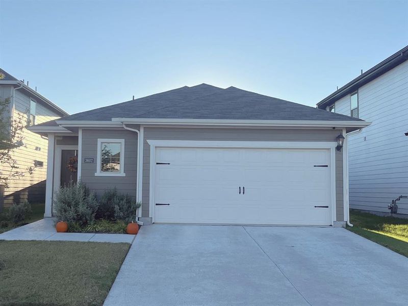 Ranch-style house with a garage