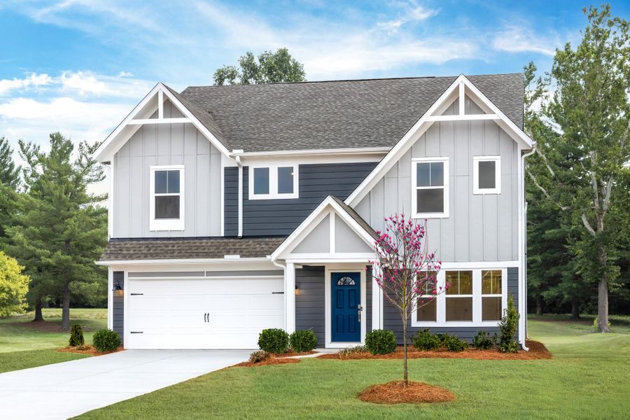 Representative exterior photo of a completed home built from the Jensen by Fischer Homes in Twin Lakes, Hoschton, GA (Image 22).