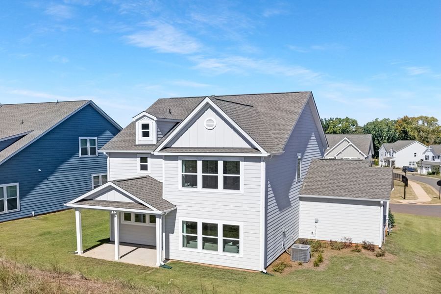 Front exterior of a new home in Edgewater - The Links, Lancaster, SC, highlighting curb appeal (Image 1). Front exterior of a new home in Edgewater - The Links, Lancaster, SC, highlighting curb appeal (Image 1).