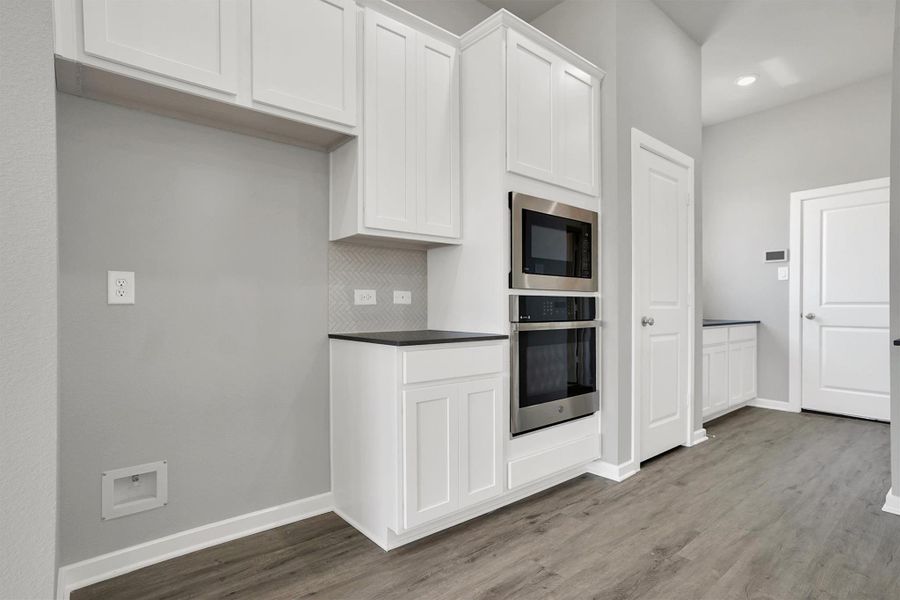 Furnished interior view inside a new home in Sunterra 50s, Katy (Image 4).