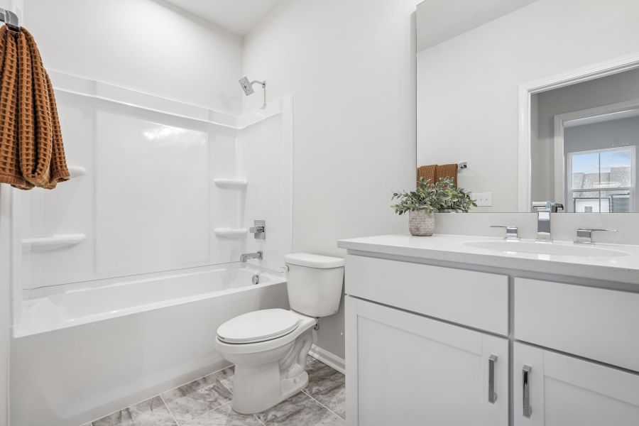 Representative furnished interior of a home built from the Huck by Tri Pointe Homes in Twinleaf Townes, Chapel Hill (Image 11). Representative furnished interior of a home built from the Huck by Tri Pointe Homes in Twinleaf Townes, Chapel Hill (Image 11).