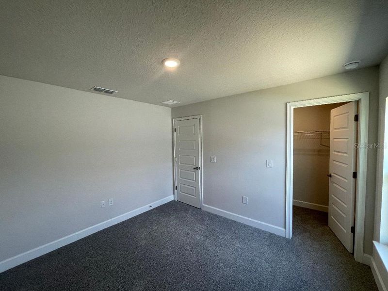 Spacious, unfurnished interior of a new home in Abbey Glen, Dade City (Image 27).