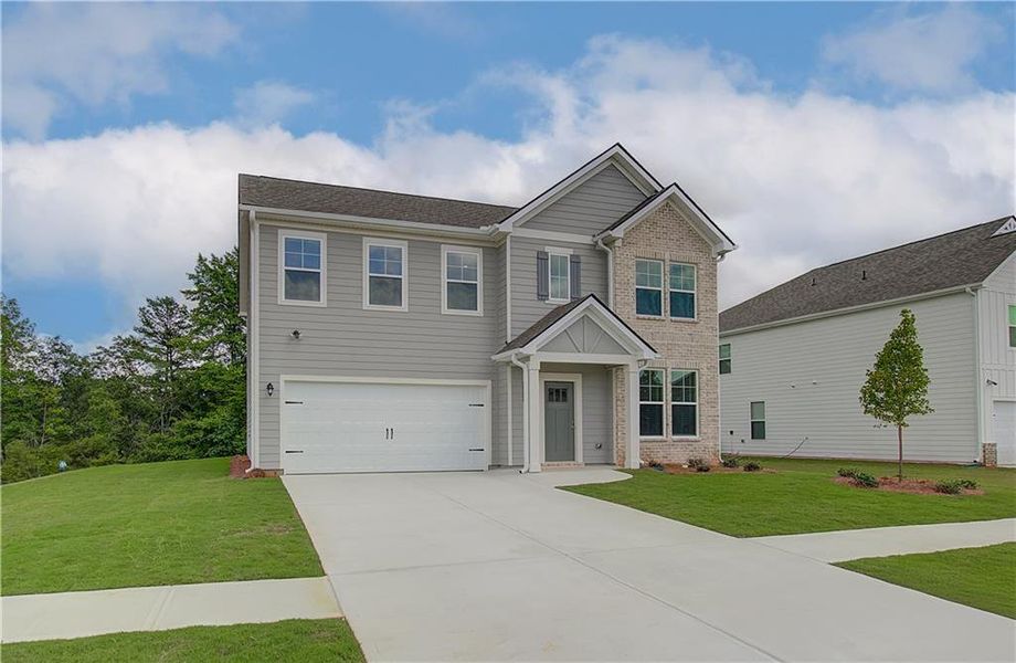 Front exterior of a new home in Chapel Hill, Newnan, GA, highlighting curb appeal (Image 17).