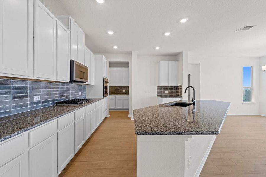 Furnished interior view inside a new home in Salerno - Classic Collection, Round Rock (Image 5). Furnished interior view inside a new home in Salerno - Classic Collection, Round Rock (Image 5).