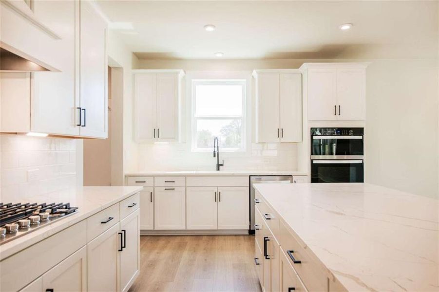 Furnished interior view inside a new home in The Paddocks at Doc Hughes, Buford (Image 9).