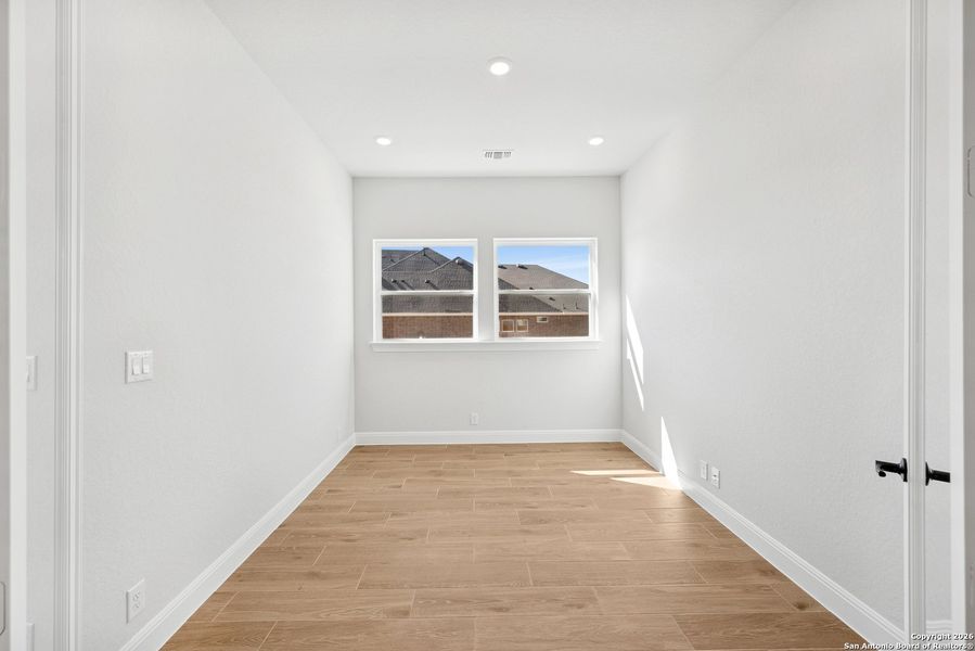 Spacious, unfurnished interior of a new home in Windsong - Legacy Series, Boerne (Image 18).