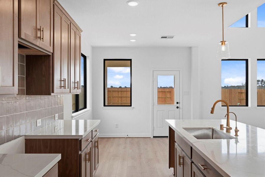 Furnished interior view inside a new home in Spring Creek Trails, Magnolia (Image 9).