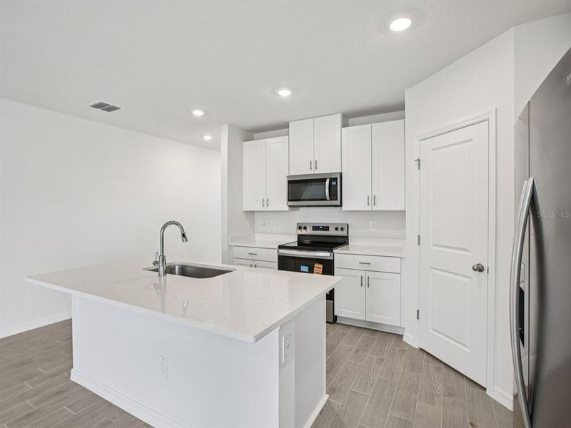 Furnished interior view inside a new home in Magnolia Bay - Classic Series, Nokomis (Image 8).