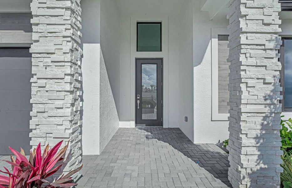 Exterior details and patio area of a home in Esprit at Avenir, Palm Beach Gardens (Image 27). Exterior details and patio area of a home in Esprit at Avenir, Palm Beach Gardens (Image 27).