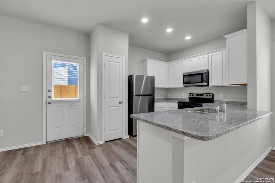 Furnished interior view inside a new home in , San Antonio (Image 4).