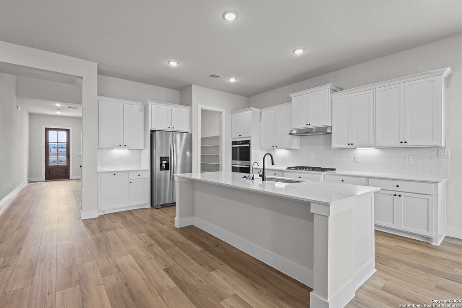 Furnished interior view inside a new home in Homestead, Schertz (Image 12).
