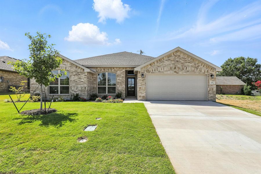 Representative exterior photo of a completed home built from the Iverson I by Cheldan Homes in Pitcock Addition, Graham, TX (Image 32).