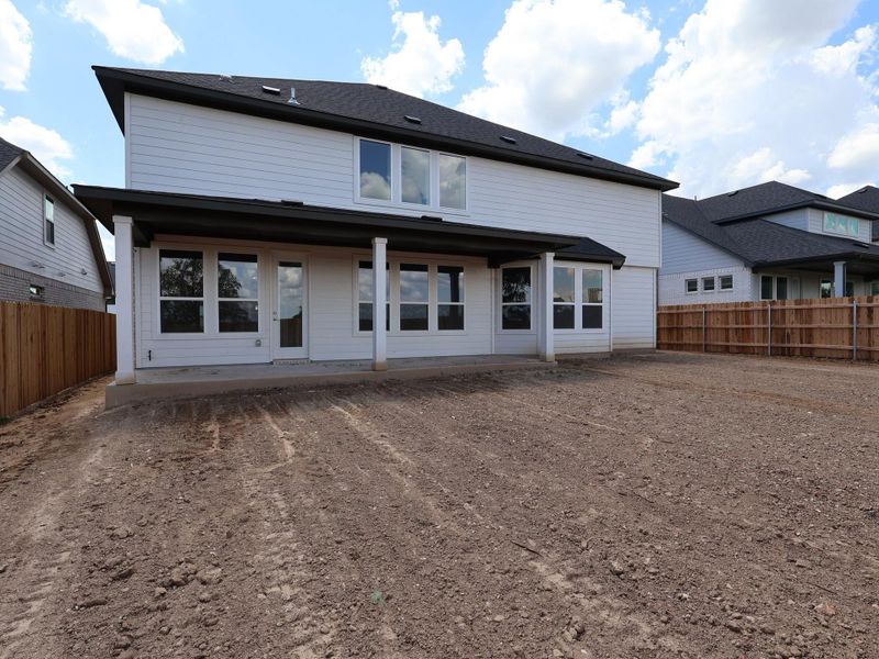 Front exterior of a new home in Edgewood, Leander, TX, highlighting curb appeal (Image 2). Front exterior of a new home in Edgewood, Leander, TX, highlighting curb appeal (Image 2).