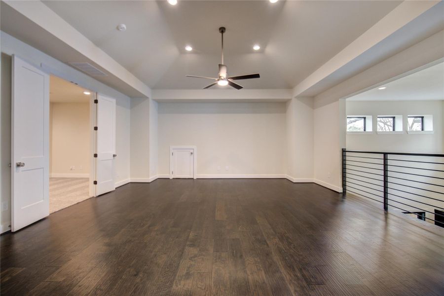 Large game room is connected to the media room on the second floor