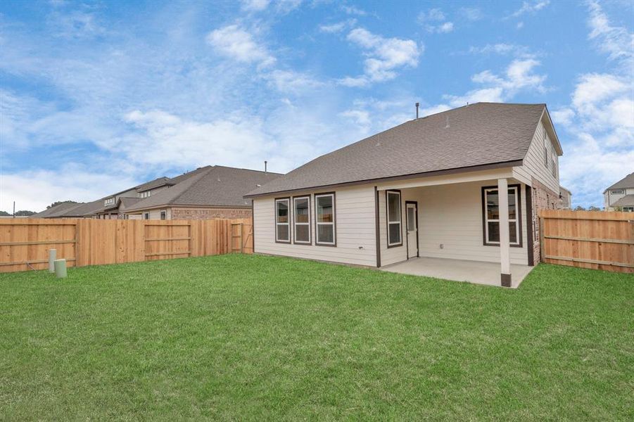 Step into a world of outdoor possibilities with this remarkable backyard. Sample photo of completed home with similar floor plan. As-built interior colors and selections may vary.