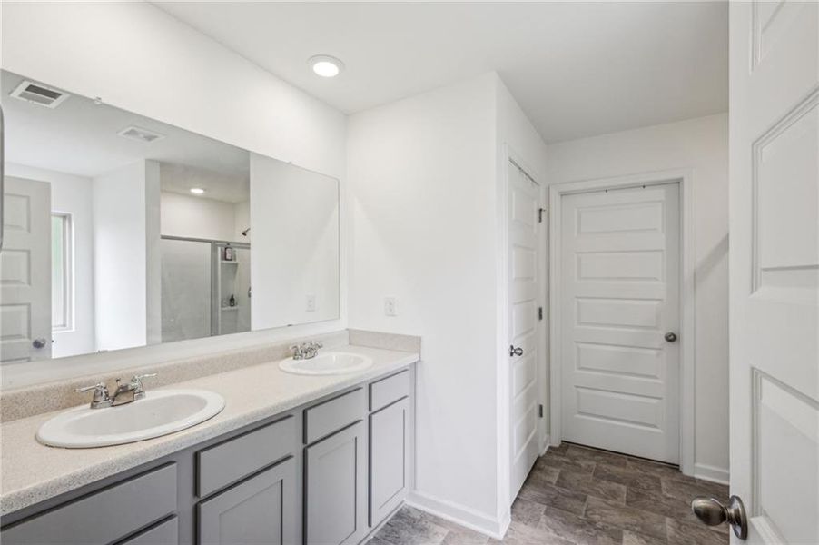 Furnished interior view inside a new home in The Enclave at Flat Rock Hills, Stonecrest (Image 28).