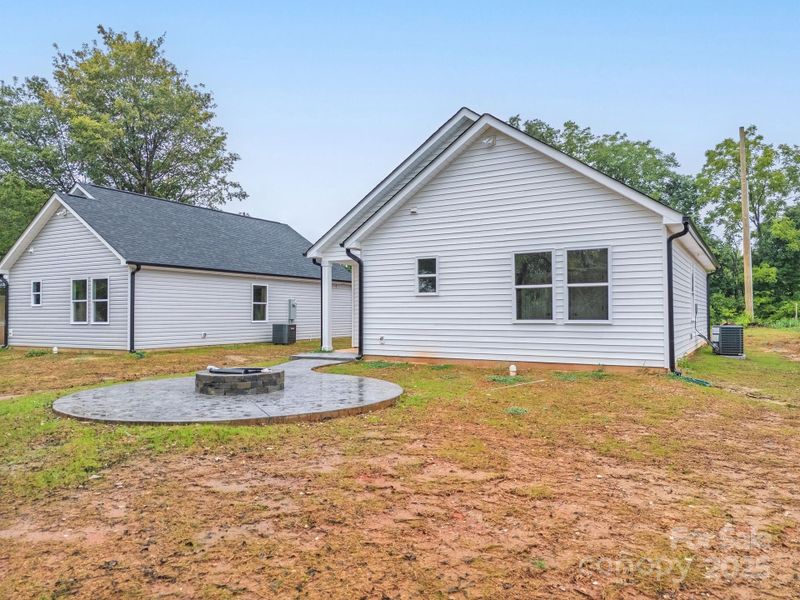 Front exterior of a new home in , East Spencer, NC, highlighting curb appeal (Image 22).