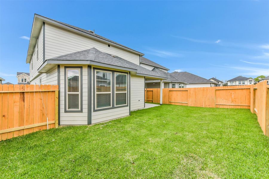 Exterior details and patio area of a home in , Houston (Image 23).