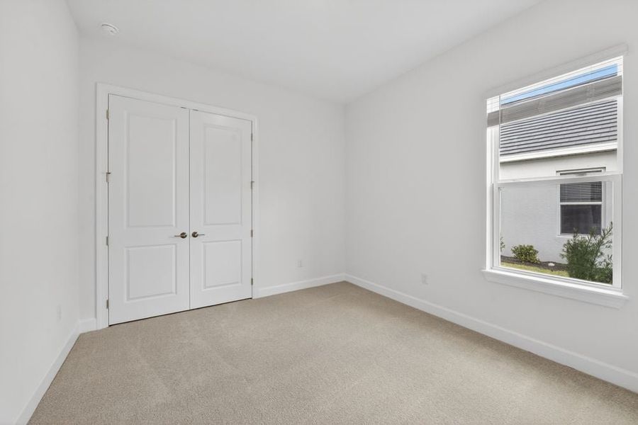 Representative unfurnished interior of a home built from the Sereno by Taylor Morrison in Esplanade by the Islands, Naples (Image 12).