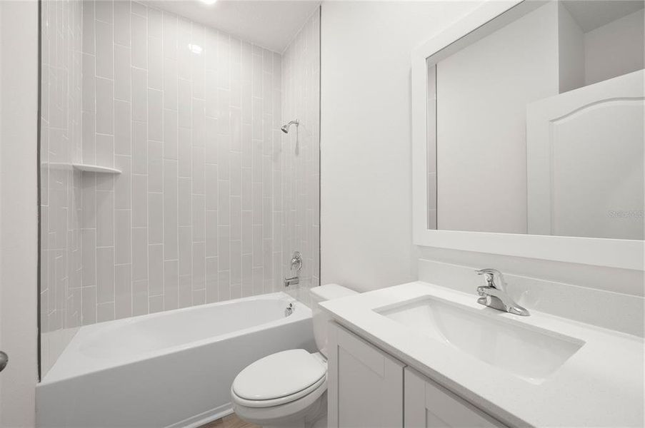 Furnished interior view inside a new home in Tula Parc, Astatula (Image 7).