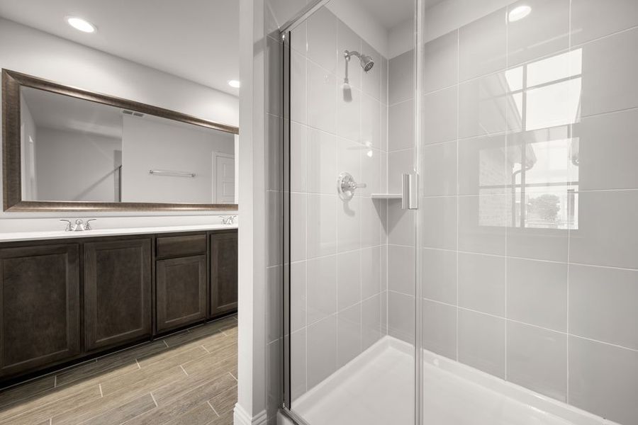 Representative exterior photo of a completed home built from the Brownwood by Impression Homes in Main Street Village, Mansfield, TX (Image 18). Representative exterior photo of a completed home built from the Brownwood by Impression Homes in Main Street Village, Mansfield, TX (Image 18).