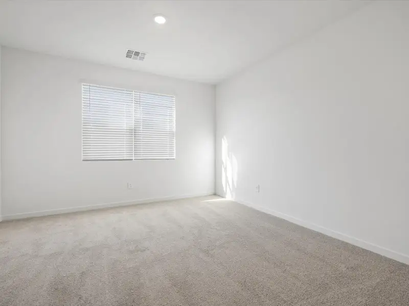 Spacious, unfurnished interior of a new home in Entrada Estate Series, Tolleson (Image 12).