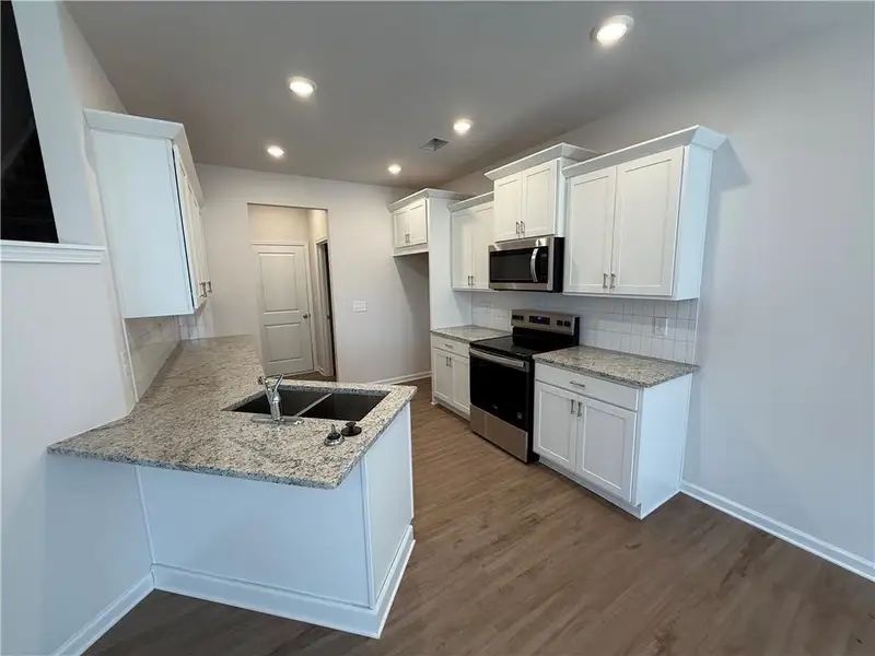 Furnished interior view inside a new home in Longview Run, Decatur (Image 6).