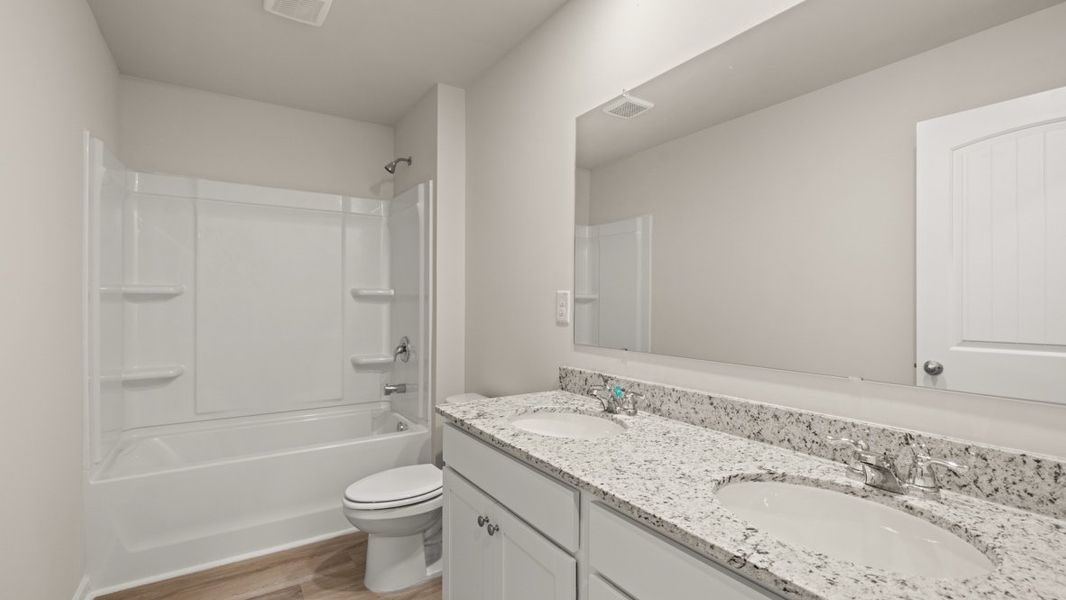 Representative furnished interior of a home built from the Elle by D.R. Horton in South Wind, South Fulton (Image 13).