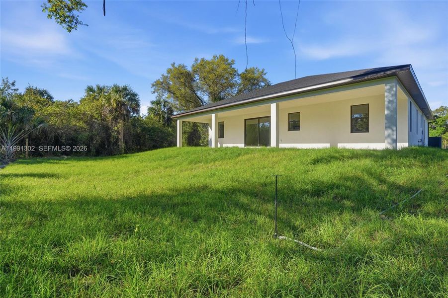 Exterior details and patio area of a home in , Labelle (Image 28).