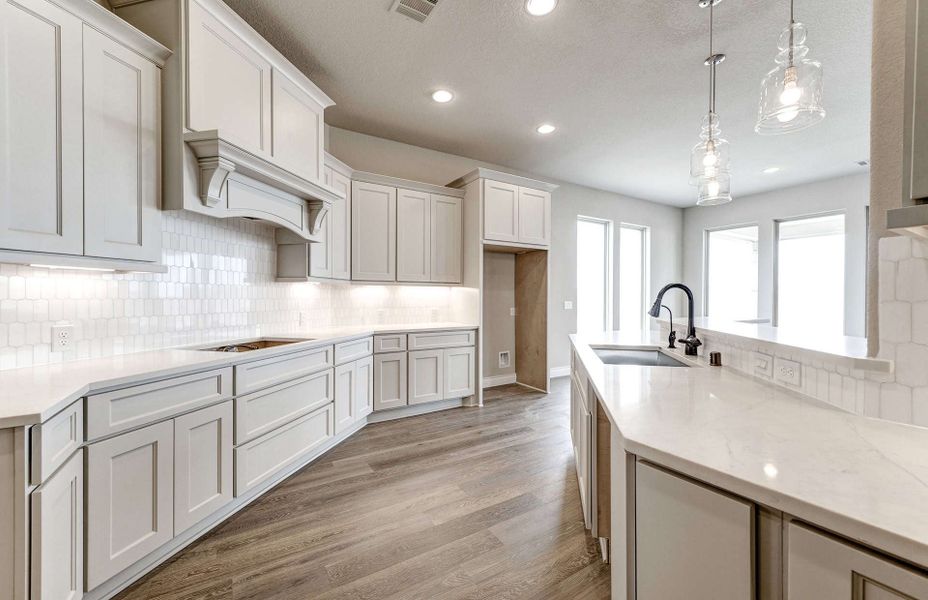 Furnished interior view inside a new home in Bridgeland 60′, Cypress (Image 5).